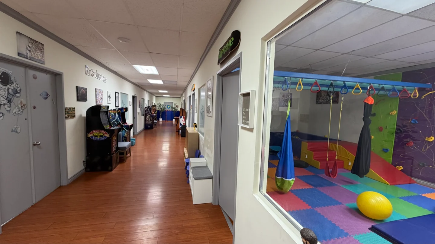 Activity-room hallway at Kori's Glendale center