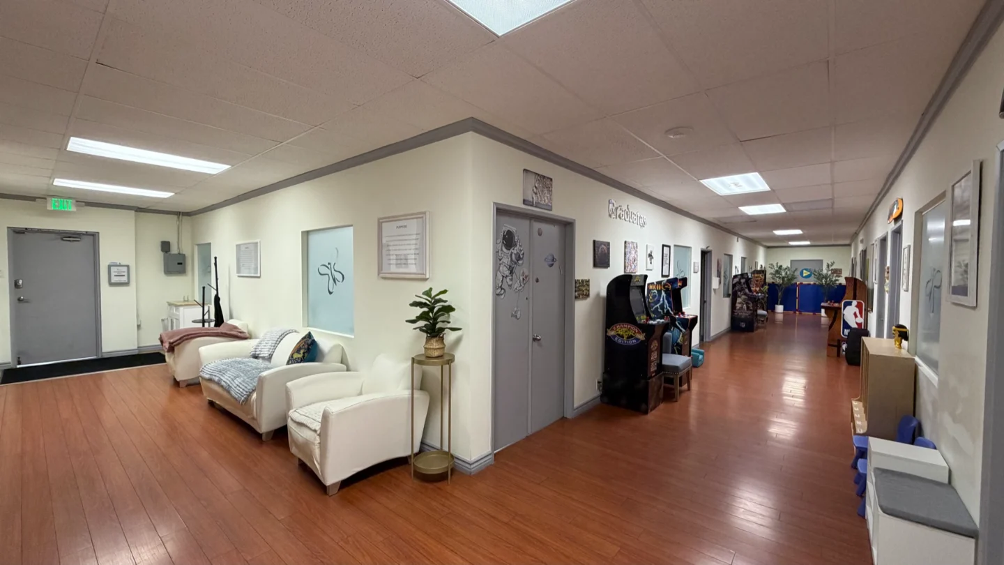 Lounge seating and hallway inside Kori's Behavioral Center in Glendale